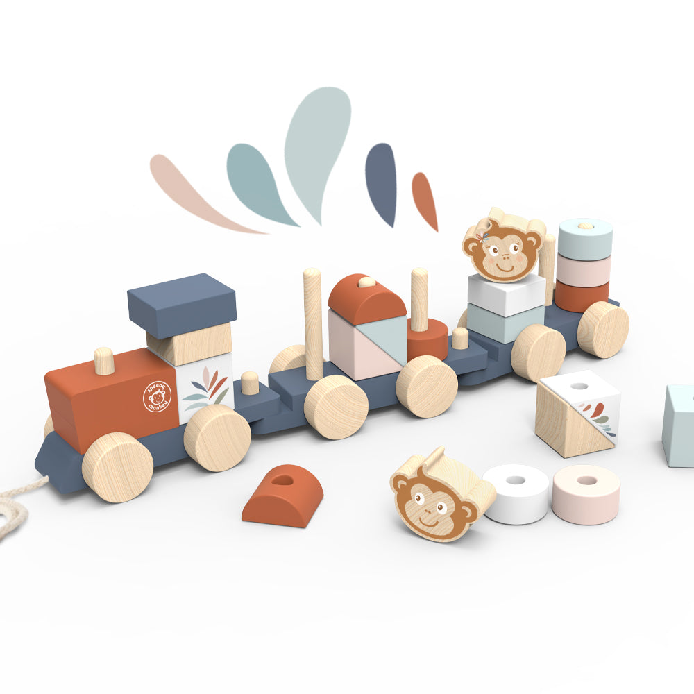 SPEEDY MONKEY Train Stacker with stackable wooden blocks removed and laid out — showing the full set of shapes and monkey characters. Personalised wooden toddler toy by NARA