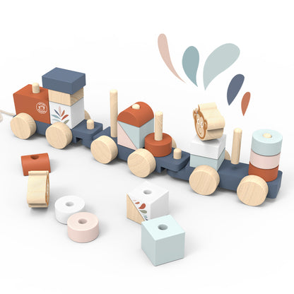 SPEEDY MONKEY Train Stacker shown at an angle with colourful wooden blocks removed — displaying the full range of shapes in sage, blush, terracotta, and slate. FSC certified stacking toy by NARA.