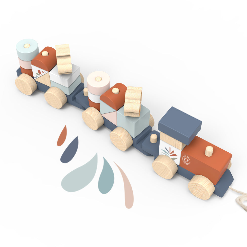 SPEEDY MONKEY Train Stacker overhead view — three-carriage wooden pull-along train fully stacked with colourful blocks in sage, blush, terracotta, and slate. Personalised baby gift by NARA.