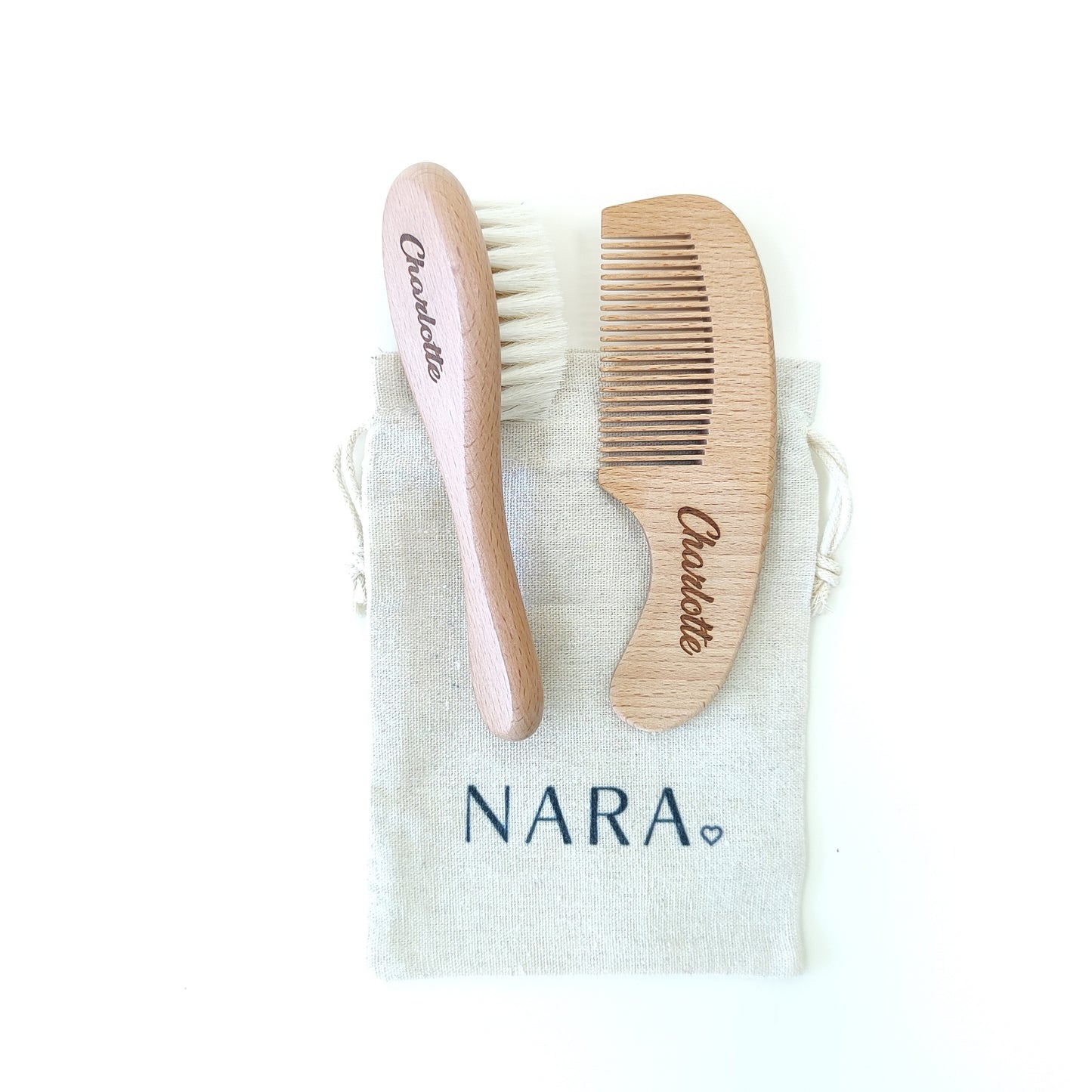 NARA Personalised Beechwood Hairbrush and Comb Set engraved with the name Charlotte, presented on a NARA cotton bag