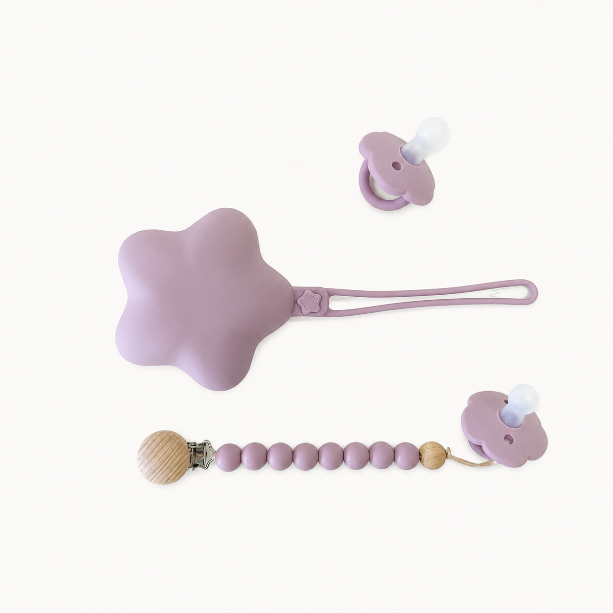 NARA Personalised Pacifier, Clip & Case Set in Pale Mauve — two silicone dummies, personalised wooden dummy clip and star-shaped silicone case, white background
